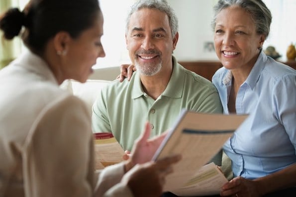 sales team discussing the customer lifetime value metrics for the company