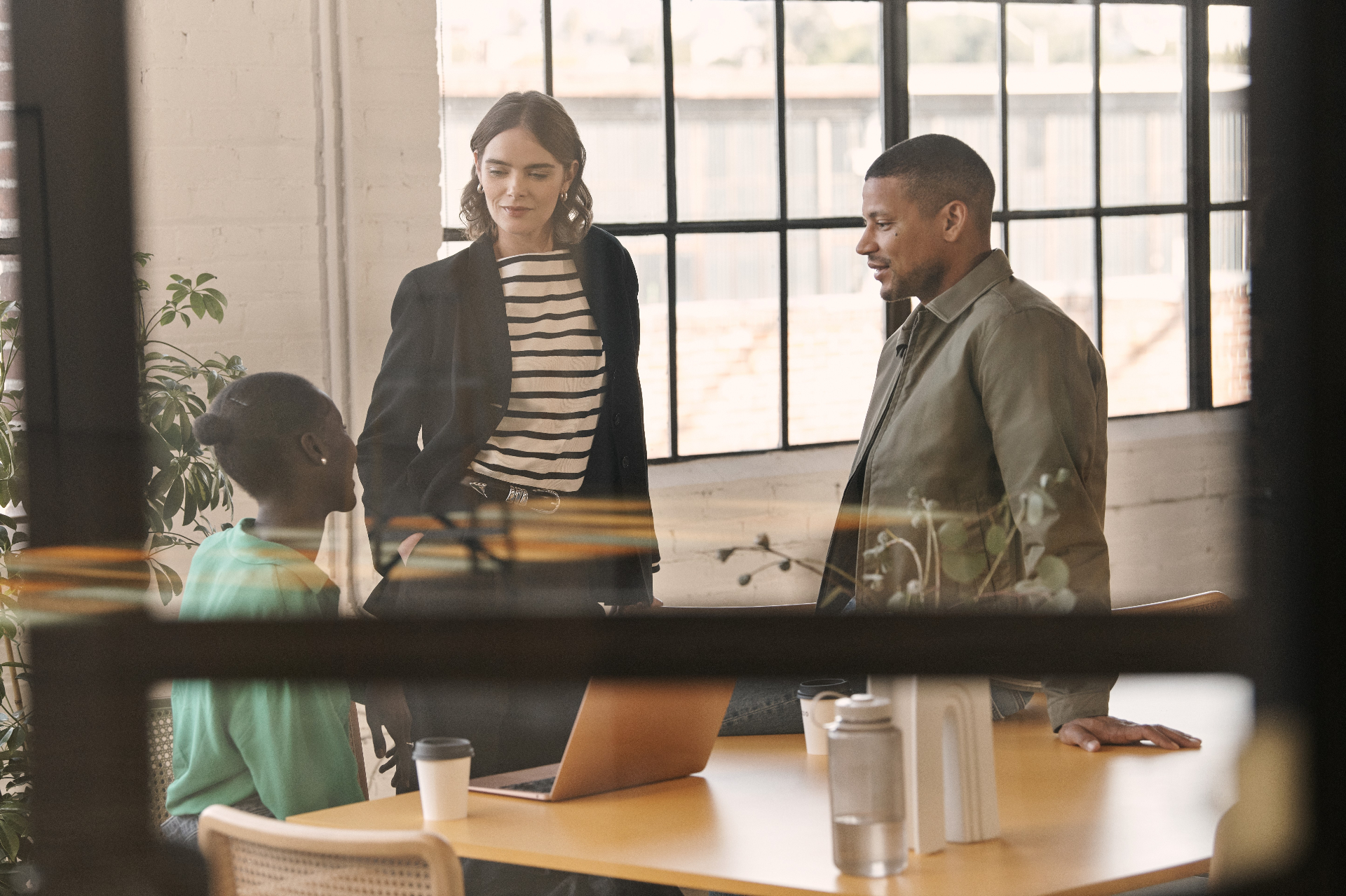 Partner team collaborating in workspace